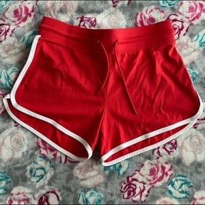 Alphalete Curve Shorts in Red